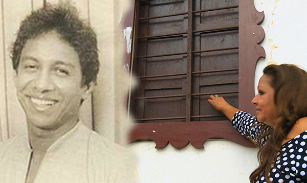 Un cantor descalzo en la ventana marroncita